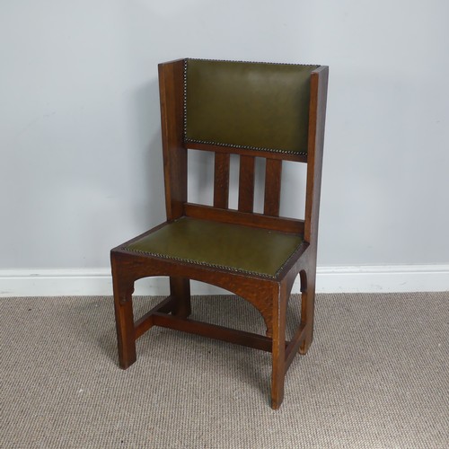 580 - An Arts and Crafts oak occasional Chair, attributed to Leonard Wyburd for Liberty & co, with uph... 