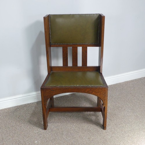 580 - An Arts and Crafts oak occasional Chair, attributed to Leonard Wyburd for Liberty & co, with uph... 