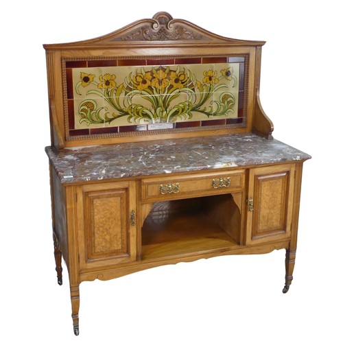 564 - An Arts and Crafts ash Washstand, in the manner of Shapland and Petter, tiled back with stylised Art... 