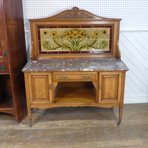 564 - An Arts and Crafts ash Washstand, in the manner of Shapland and Petter, tiled back with stylised Art... 