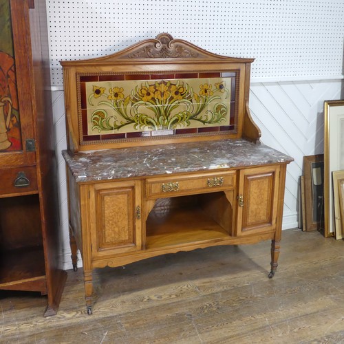 564 - An Arts and Crafts ash Washstand, in the manner of Shapland and Petter, tiled back with stylised Art... 