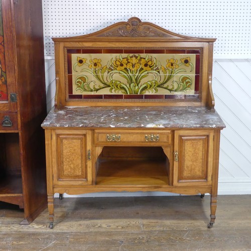 564 - An Arts and Crafts ash Washstand, in the manner of Shapland and Petter, tiled back with stylised Art... 