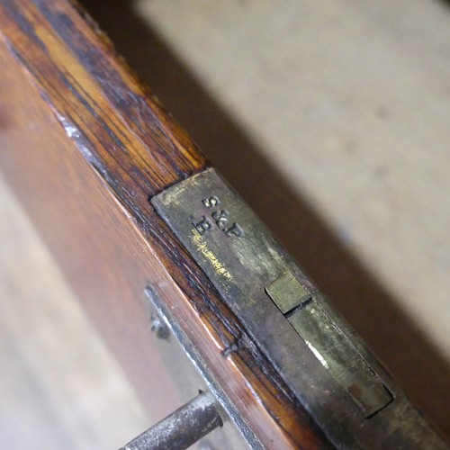 522 - A Shapland and Petter of Barnstaple Arts and Crafts oak hall Cabinet / Cupboard, with stencilled pan... 