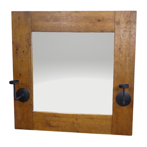 501 - An impressive craftsman-made oak framed Wall Mirror, with iron candle sconces, 122cm x 122cm.... 