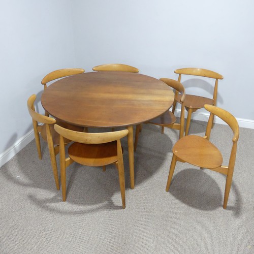 407 - Hans Wegner for Fritz Hansen ; A Danish teak and beech dining Table with seven 'heart' Chairs, the c... 