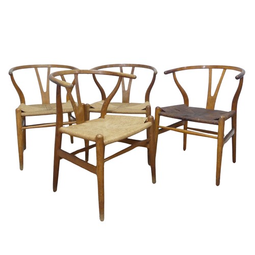 406 - Hans Wegner (Danish 1914-2007) for Carl Hansen & Son ; A set of four 'Wishbone Chairs / Y-Chairs... 