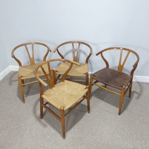 406 - Hans Wegner (Danish 1914-2007) for Carl Hansen & Son ; A set of four 'Wishbone Chairs / Y-Chairs... 