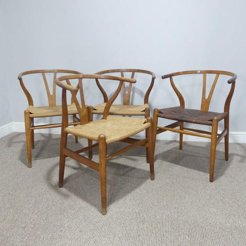 406 - Hans Wegner (Danish 1914-2007) for Carl Hansen & Son ; A set of four 'Wishbone Chairs / Y-Chairs... 