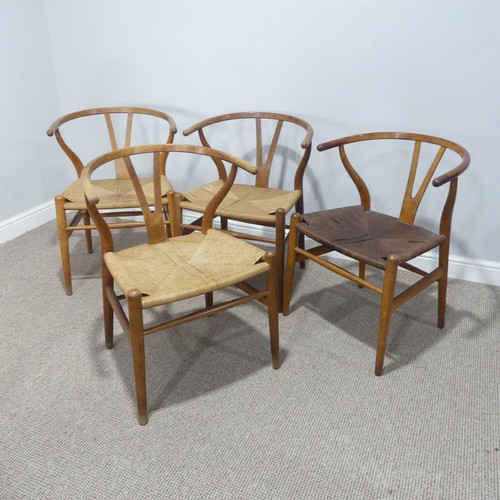 406 - Hans Wegner (Danish 1914-2007) for Carl Hansen & Son ; A set of four 'Wishbone Chairs / Y-Chairs... 