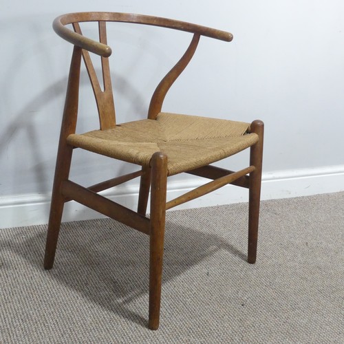 406 - Hans Wegner (Danish 1914-2007) for Carl Hansen & Son ; A set of four 'Wishbone Chairs / Y-Chairs... 