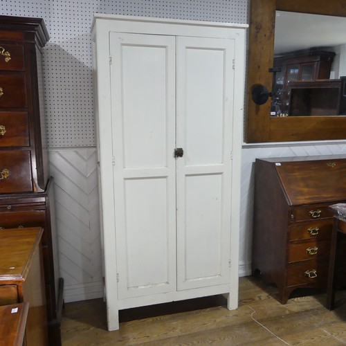 638 - An early 20th century painted pine housekeepers Cupboard, large panelled doors enclosing four deep s... 