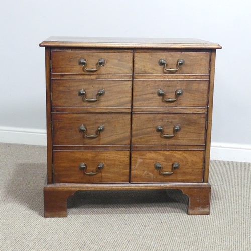 628 - A Georgian mahogany Bachelor's Chest, converted to cupboards, of small proportions, raised on bracke... 