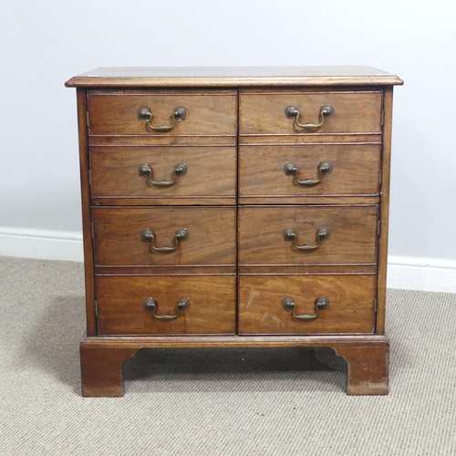 628 - A Georgian mahogany Bachelor's Chest, converted to cupboards, of small proportions, raised on bracke... 