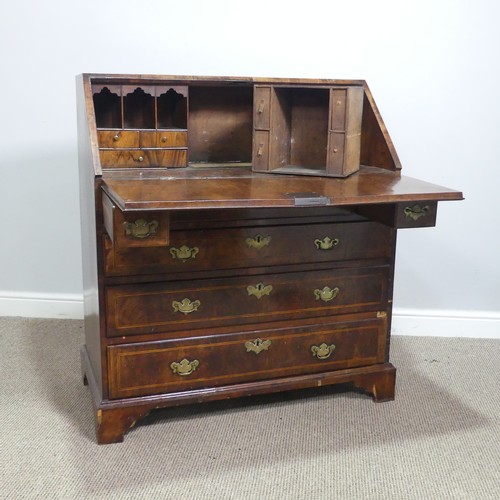 710 - A Georgian mahogany Bureau, sloped fall front with inlaid banding, concealing fitted interior above ... 