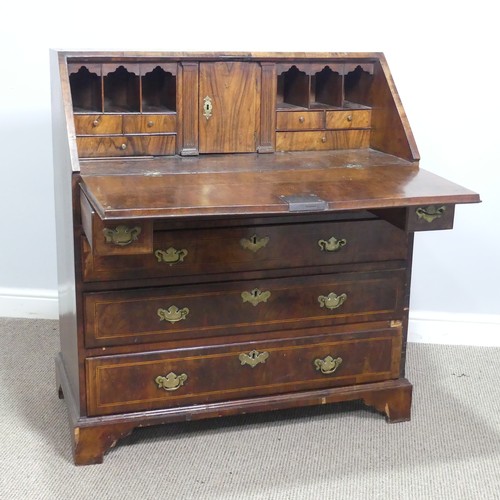 710 - A Georgian mahogany Bureau, sloped fall front with inlaid banding, concealing fitted interior above ... 