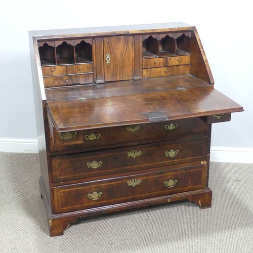 710 - A Georgian mahogany Bureau, sloped fall front with inlaid banding, concealing fitted interior above ... 