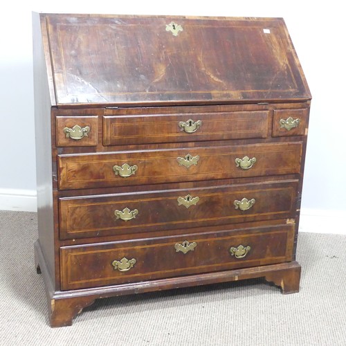 710 - A Georgian mahogany Bureau, sloped fall front with inlaid banding, concealing fitted interior above ... 