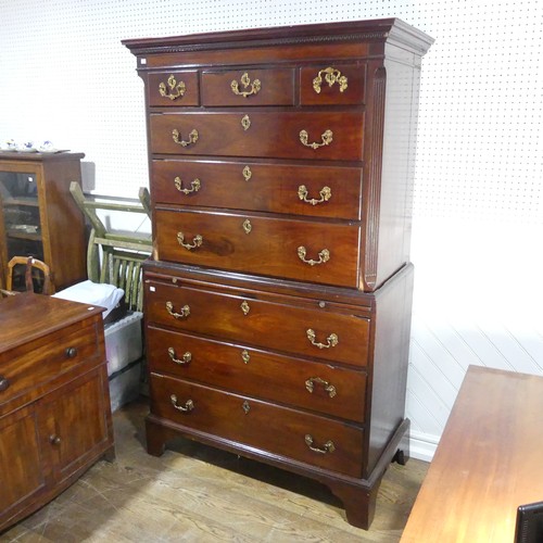 622 - A Georgian mahogany Chest on Chest, moulded cornice with geometric banding, above reeded edges and t... 