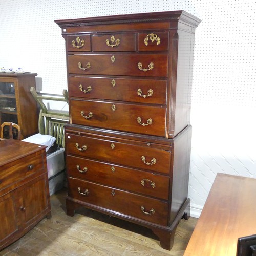 622 - A Georgian mahogany Chest on Chest, moulded cornice with geometric banding, above reeded edges and t... 