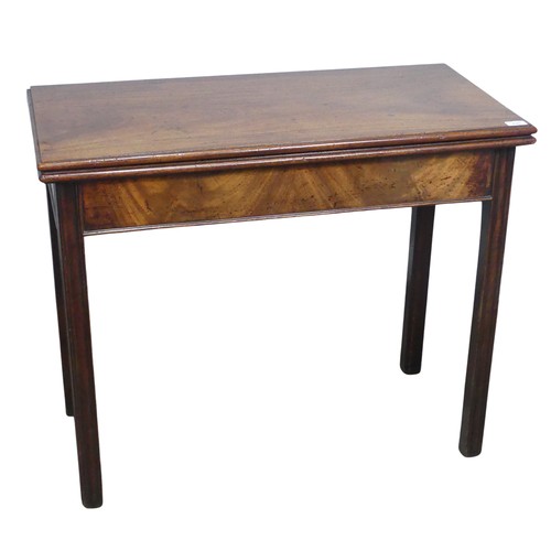 625 - A Georgian mahogany folding tea Table, rectangular top raised on four square and canted supports, on... 