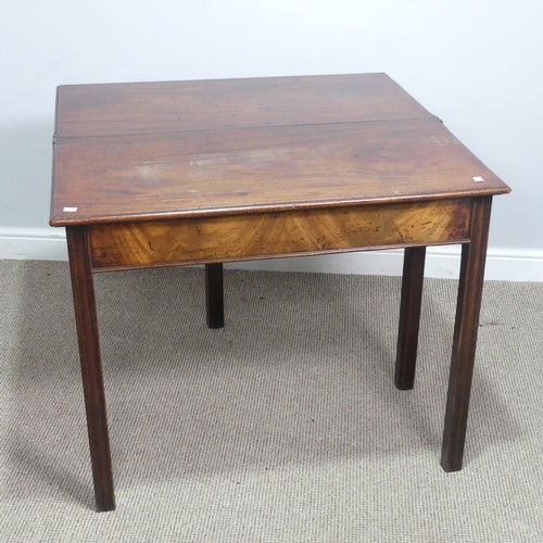 625 - A Georgian mahogany folding tea Table, rectangular top raised on four square and canted supports, on... 