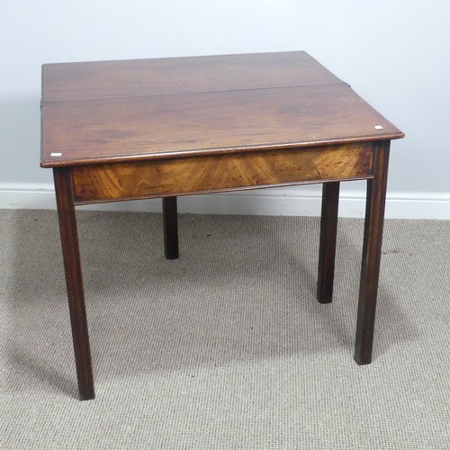 625 - A Georgian mahogany folding tea Table, rectangular top raised on four square and canted supports, on... 