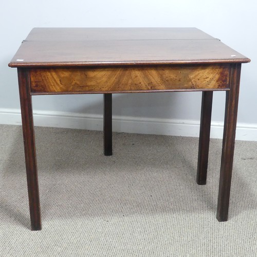 625 - A Georgian mahogany folding tea Table, rectangular top raised on four square and canted supports, on... 