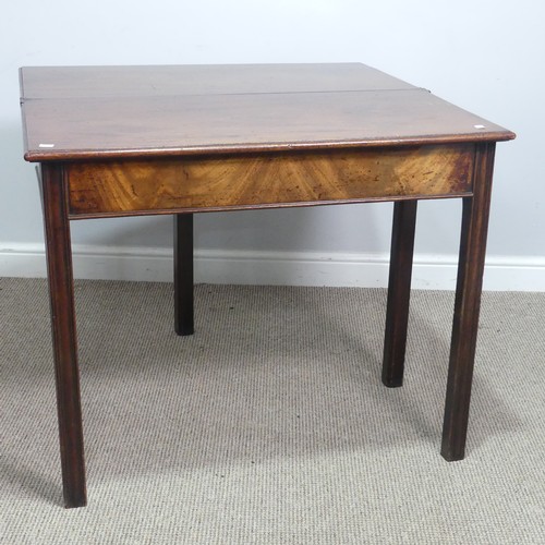 625 - A Georgian mahogany folding tea Table, rectangular top raised on four square and canted supports, on... 