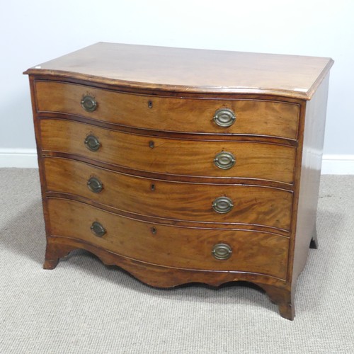 627 - A Georgian mahogany serpentine Chest of drawers, of four long graduating drawers with oak carcass, r... 