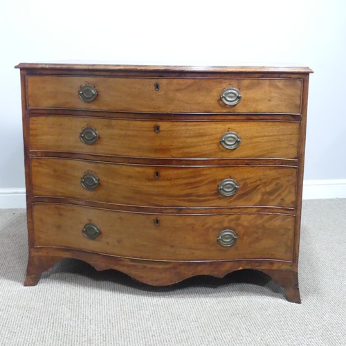 627 - A Georgian mahogany serpentine Chest of drawers, of four long graduating drawers with oak carcass, r... 