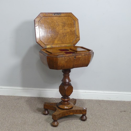 630 - A 19th century burr walnut Teapoy / Tea Caddy on stand, octagonal hinged top concealing two hinged p... 