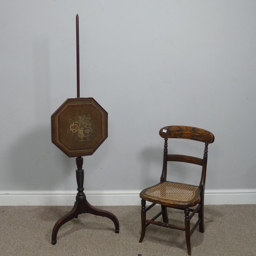 624 - A 19th century mahogany Pole Screen, with octagonal embroidered panel raised on tripod base, H 132 c... 