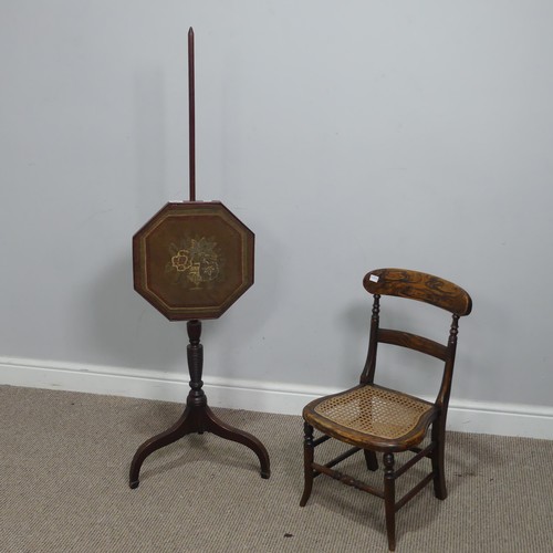 624 - A 19th century mahogany Pole Screen, with octagonal embroidered panel raised on tripod base, H 132 c... 