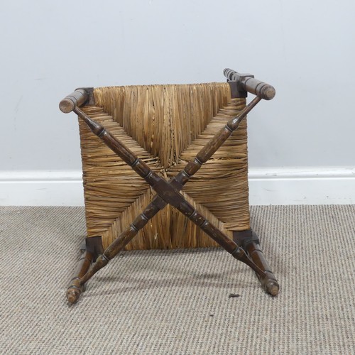 634 - A 19th century sussex-style bobbin turned corner Chair, with rush seat, W 41 cm x H 68 cm x D 42 cm.... 