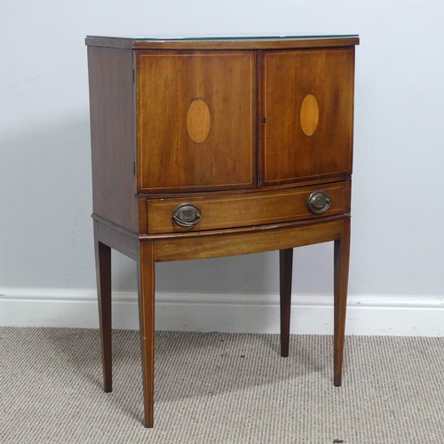 631 - An Edwardian mahogany bow-fronted and inlaid side Cupboard, of small proportions, with two small cup... 