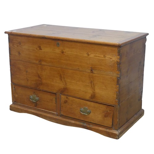 620 - An antique pine mule Chest, rectangular hinged top above two short drawers, raised on moulded plinth... 