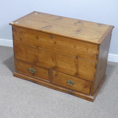 620 - An antique pine mule Chest, rectangular hinged top above two short drawers, raised on moulded plinth... 