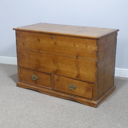 620 - An antique pine mule Chest, rectangular hinged top above two short drawers, raised on moulded plinth... 