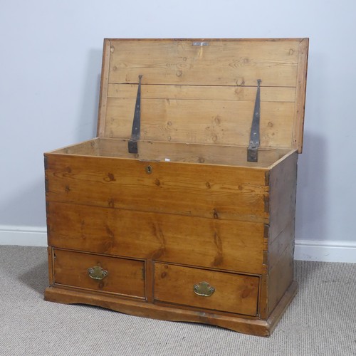 620 - An antique pine mule Chest, rectangular hinged top above two short drawers, raised on moulded plinth... 