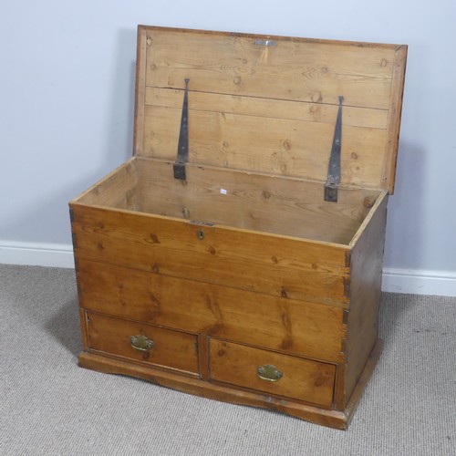 620 - An antique pine mule Chest, rectangular hinged top above two short drawers, raised on moulded plinth... 