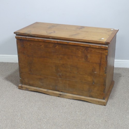 620 - An antique pine mule Chest, rectangular hinged top above two short drawers, raised on moulded plinth... 