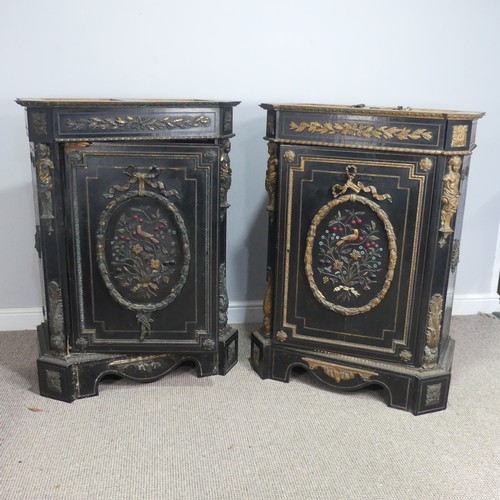 584 - A pair of Moroccan style black lacquered and gilt Cabinets, marbles tops above central gilt metal fo... 