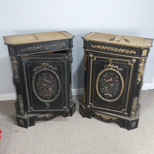 584 - A pair of Moroccan style black lacquered and gilt Cabinets, marbles tops above central gilt metal fo... 