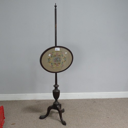 606 - A 19th century mahogany pole Screen, embroidered panel raised on cabriole tripod base, H 154 cm.&nbs... 