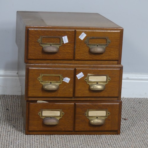 577 - Three early 20th century oak two drawer Filing Cabinets, with brass cup handles and index holders, e... 