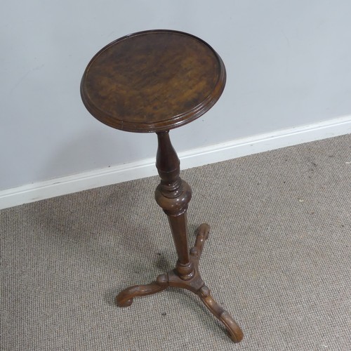 513 - A Victorian style mahogany plant Stand, moulded circular top on turned and canted column, raise... 