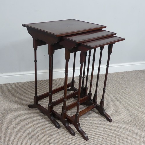 576 - A nest of three Edwardian mahogany tea Tables, raised on turned legs, (largest) W 51 cm x H 70 cm x ... 