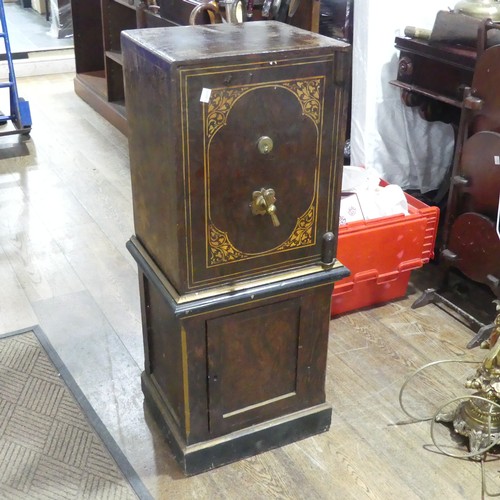 600 - A faux wood metal painted floor standing Safe, by 'Hobbs & co, London', floor screws and key pre... 