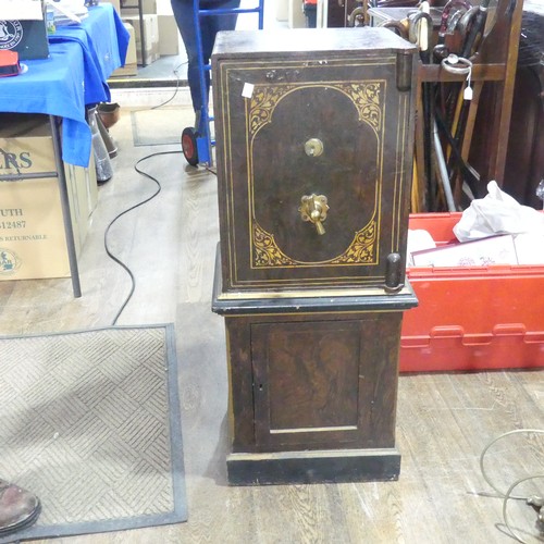 600 - A faux wood metal painted floor standing Safe, by 'Hobbs & co, London', floor screws and key pre... 