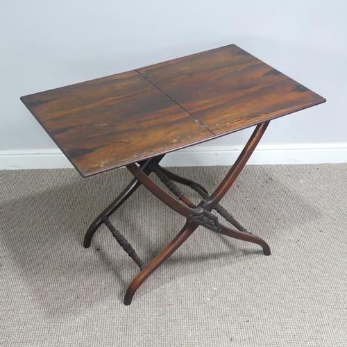 592 - A Victorian rosewood folding coaching Table, raised on a chamfered X-shaped stand with tapering... 